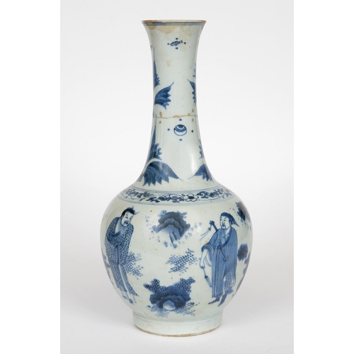 952 - 17THC CHINESE BLUE & WHITE VASE. A transitional porcelain blue and white vase, the bottle shaped vas... 