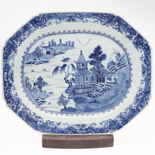 955 - 18THC CHINESE EXPORT BLUE & WHITE PLATTER. An 18thc platter of rectangular canted shape, painted wit... 