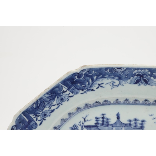 955 - 18THC CHINESE EXPORT BLUE & WHITE PLATTER. An 18thc platter of rectangular canted shape, painted wit... 