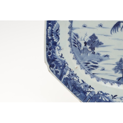 955 - 18THC CHINESE EXPORT BLUE & WHITE PLATTER. An 18thc platter of rectangular canted shape, painted wit... 