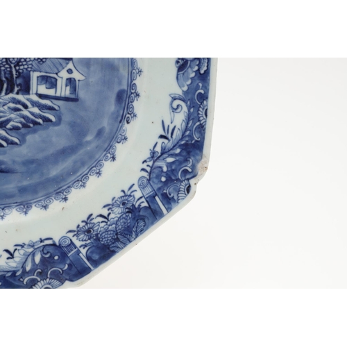 955 - 18THC CHINESE EXPORT BLUE & WHITE PLATTER. An 18thc platter of rectangular canted shape, painted wit... 