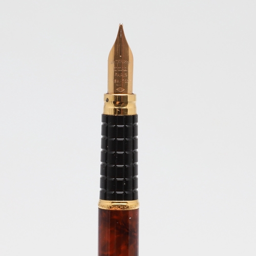 1535 - WATERMAN: CARENE AND IDEAL FOUNTAIN PENS. the Carene in a marine amber colourway with 18k nib, the I... 