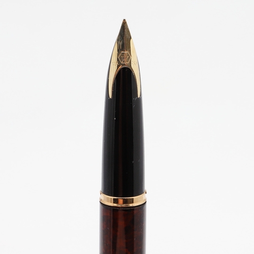 1535 - WATERMAN: CARENE AND IDEAL FOUNTAIN PENS. the Carene in a marine amber colourway with 18k nib, the I... 