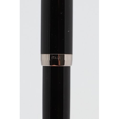 1533 - A SHEAFFER LEGACY FOUNTAIN PEN. the black case with gold plated trim and white dot to cap, 18k nib; ... 