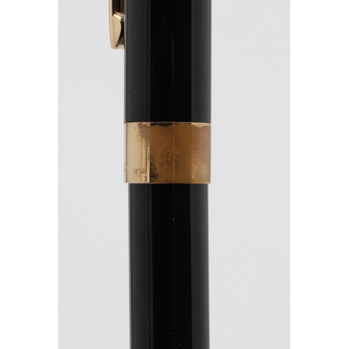 1533 - A SHEAFFER LEGACY FOUNTAIN PEN. the black case with gold plated trim and white dot to cap, 18k nib; ... 