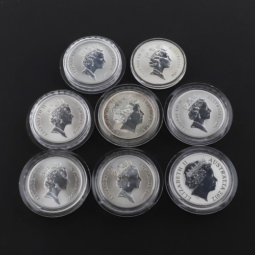 1000 - A COLLECTION OF EIGHT AUSTRALIAN SILVER 1 OZ KANGAROO COINS, 1993 AND LATER. A collection of eight E... 