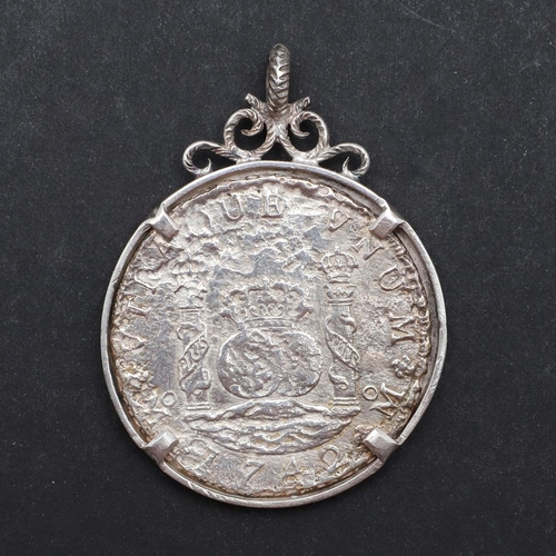 1006 - A SPANISH SILVER 8 REALES COIN FROM THE HOLLANDIA IN AN ENGRAVED MOUNT. A Spanish 8 Reales, Madrid m... 