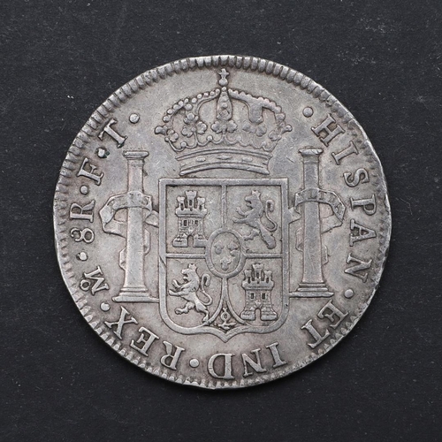 1009 - A CHARLES IIII MEXICAN 8 REALES COIN. A Mexican 8 Reales coin, Charles IV, r, Crowned shield between... 