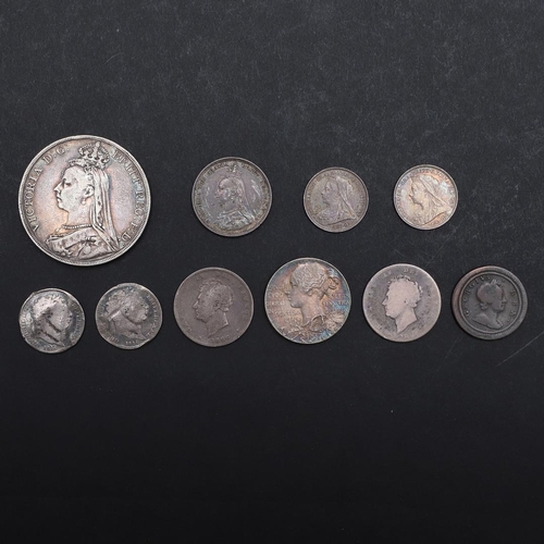 1041 - A SMALL COLLECTION OF GEORGE III AND LATER SILVER. A mixed collection of coins: George III, two shil... 