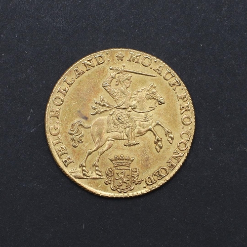 1208 - A FINE NETHERLANDS, HOLLAND, 14 GULDEN, 1751. Obverse lion rampant brandishing a sword and clutching... 