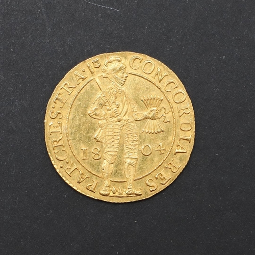 1216 - A FINE DUTCH GOLD TWO DUCAT, 1804. A knight in armour, standing shouldering his sword and clutching ... 