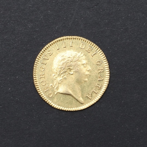 1217 - A GEORGE III HALF GUINEA, 1804. A George III Half Guinea, seventh laureate bust r. with short hair, ... 