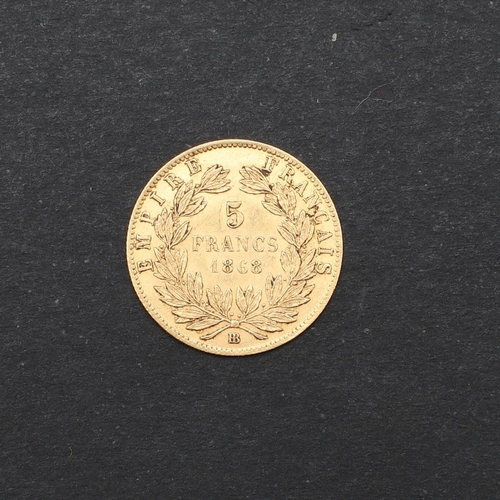 1219 - A NAPOLEON III GOLD 5 FRANC, 1868. A Gold 5 Franc piece, laureate bust r. reverse with value within ... 