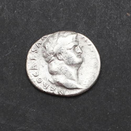 657 - ROMAN IMPERIAL COINAGE: NERO. c.54-68 A.D. A silver denarius, obverse with laureate bust r. Reverse ... 