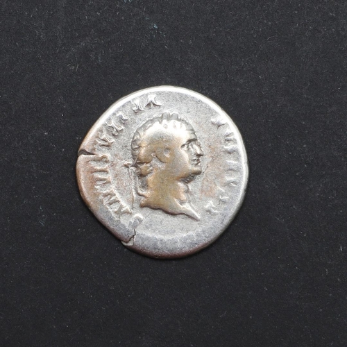 663 - ROMAN IMPERIAL COINAGE: TITUS. c.79-81. A.D. A silver denarius, obverse with laureate bust r. Revers... 