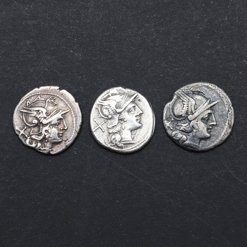 695 - THREE ROMAN REPUBLIC SILVER DENARIUS, c.211-206 B.C. Helmeted head of Roma. Reverse two figures on h... 