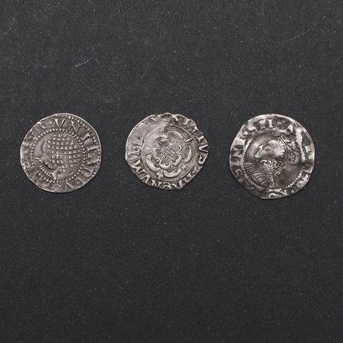 736 - A JAMES I HAMMERED SILVER PENNY AND A SIMILAR CHARLES I PENNY. An Elizabeth I penny, mint mark Martl... 