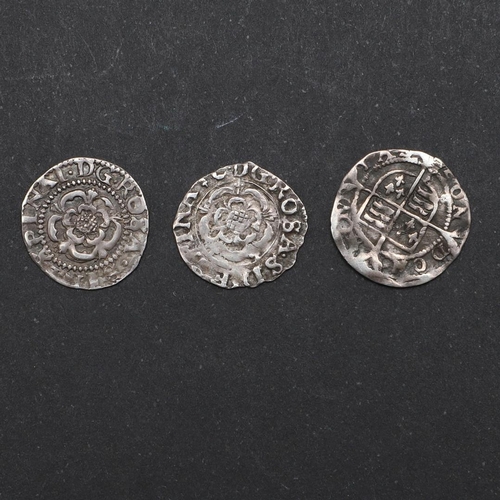 736 - A JAMES I HAMMERED SILVER PENNY AND A SIMILAR CHARLES I PENNY. An Elizabeth I penny, mint mark Martl... 