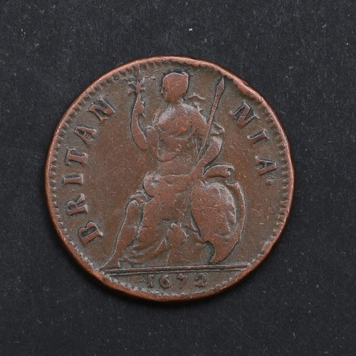 745 - A CHARLES II COPPER FARTHING, 1672. A Charles II Farthing, cuirassed bust l. reverse seated figure o... 