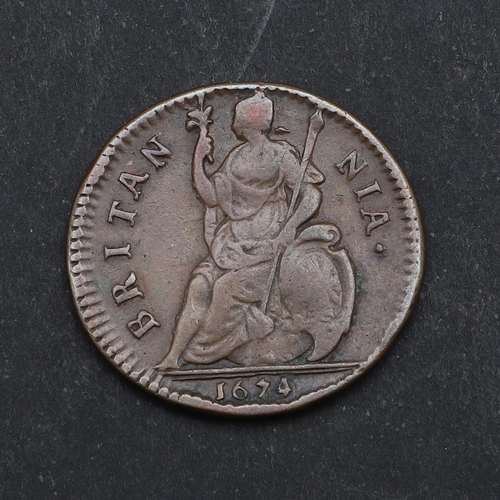 747 - A CHARLES II COPPER FARTHING, 1674. A Charles II Farthing, cuirassed bust l. reverse seated figure o... 
