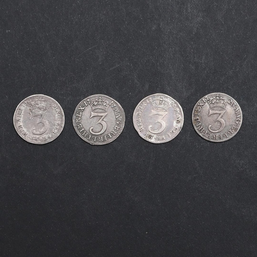 766 - FOUR GEORGE I THREEPENCE, 1717 AND SIMILAR. Four George I threepence, laureate and  draped busts r. ... 