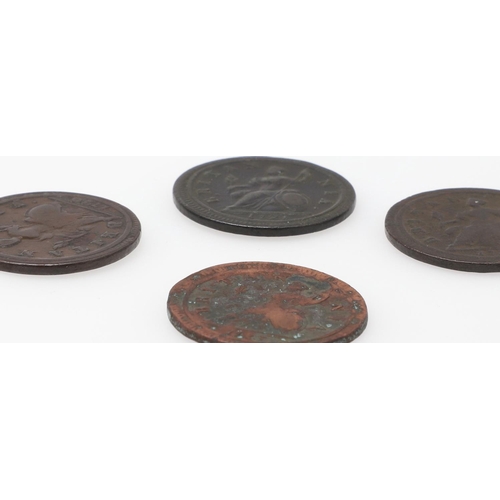 768 - A COLLECTION OF GEORGE I HALFPENCE 1719 AND LATER. A collection of George I halfpence, second issue,... 