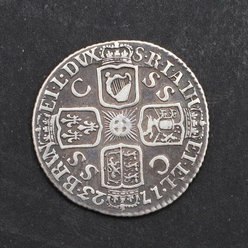 774 - A GEORGE I SIXPENCE, 1723. A George I sixpence, laureate and draped bust r., reverse with SSC for So... 