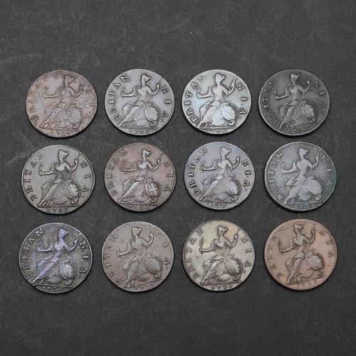 777 - A COLLECTION OF GEORGE II HALFPENCE 1729 AND LATER. A collection of George II halfpence, young laure... 