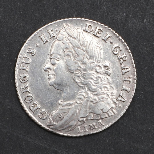783 - A GEORGE II LIMA SIXPENCE, 1745. A George II sixpence, old laureate and draped bust l. with Lima bel... 