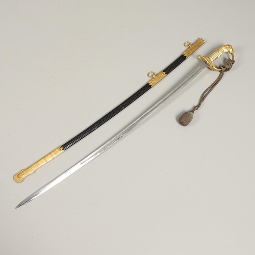 100 - AN IMPERIAL GERMAN NAVAL OFFICER's  SWORD AND SCABBARD. With an 83cm curved, pointed blade with long... 