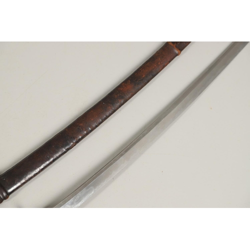 107 - A SECOND WORLD WAR JAPANESE SHIN GUNTO SWORD AND SCABBARD. With a 73cm pointed, single edged blade ,... 