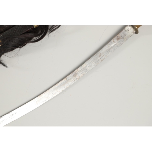 109 - A FINE MURUT TYPE SWORD AND SCABBARD FROM NORTHERN BORNEO. With a 65cm curved steel blade with a sha... 