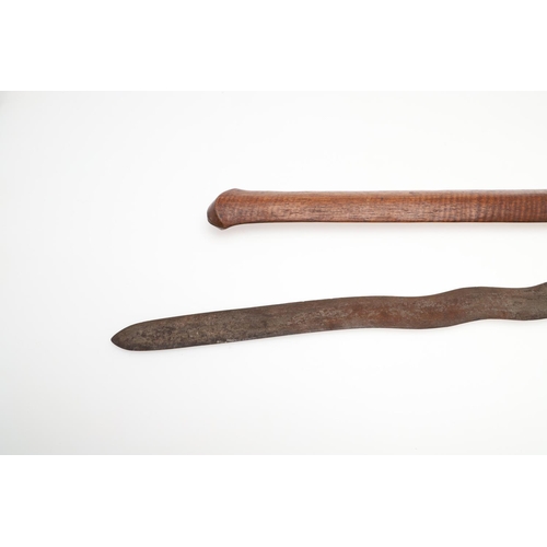 112 - TWO MALAYAN KRIS TYPE SHORT SWORDS AND SCABBARDS. With a 36c, wavy edged blade and elaborately carve... 