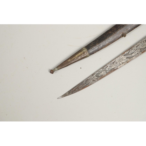 114 - A 19TH CENTURY HORN HANDLED KNIFE OR SHORT SWORD, POSSIBLY INDIAN. With a 36cm pointed blade decorat... 