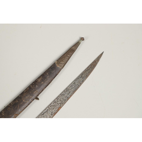 114 - A 19TH CENTURY HORN HANDLED KNIFE OR SHORT SWORD, POSSIBLY INDIAN. With a 36cm pointed blade decorat... 