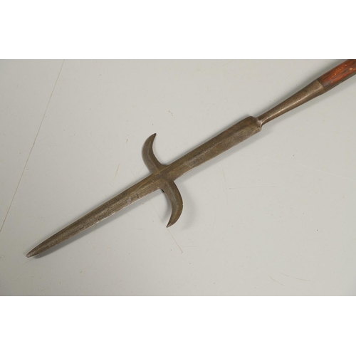 117 - AN 18TH CENTURY EUROPEAN SERGEANTS POLE ARM. A pole arm with a spear tip blade with serpentine blade... 