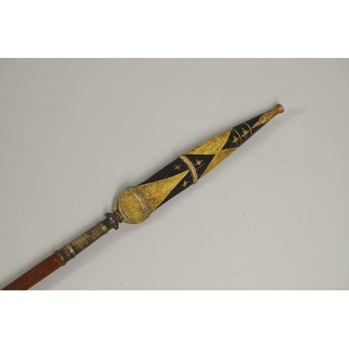 119 - AN INDONESIA SPEAR OR LANCE WITH WAVY EDGED BLADE AND PAINTED SCABBARD. The 31cm wavy edged, taperin... 