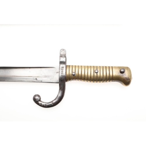 121 - A FRENCH 1866 PATTERN CHASSEPOT BAYONET AND SCABBARD. With a 57.4cm pointed, sharpened single edged ... 