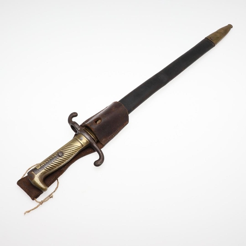 125 - AN IMPERIAL GERMAN M1871 PATTERN BAYONET AND SCABBARD. With a 45cm pointed, single sharpened edged a... 