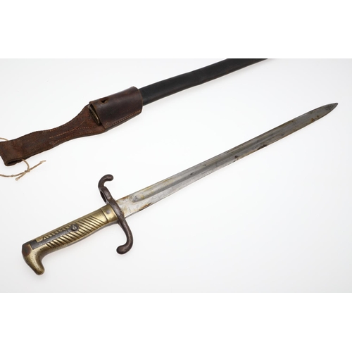 125 - AN IMPERIAL GERMAN M1871 PATTERN BAYONET AND SCABBARD. With a 45cm pointed, single sharpened edged a... 