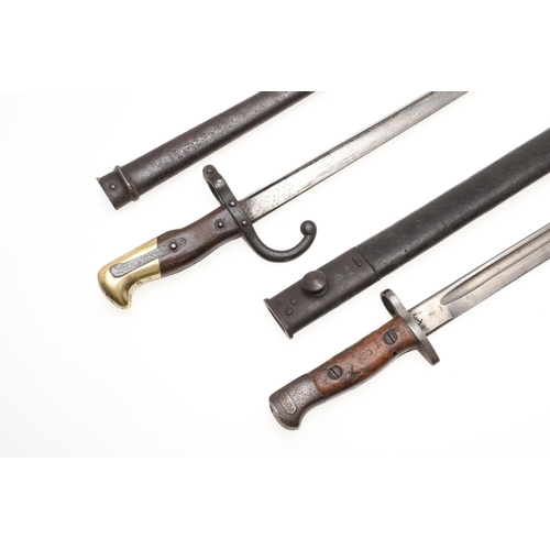 126 - A FRENCH 1874 PATTERN GRAS BAYONET AND SCABBARD AND SIMILAR BRITISH 1907 PATTERN BAYONET. A 19th cen... 