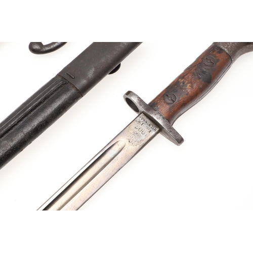 126 - A FRENCH 1874 PATTERN GRAS BAYONET AND SCABBARD AND SIMILAR BRITISH 1907 PATTERN BAYONET. A 19th cen... 