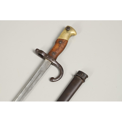 127 - A FRENCH GRAS 1874 PATTERN SWORD BAYONET AND SCABBARD. With a 52cm single edged, pointed blade, engr... 