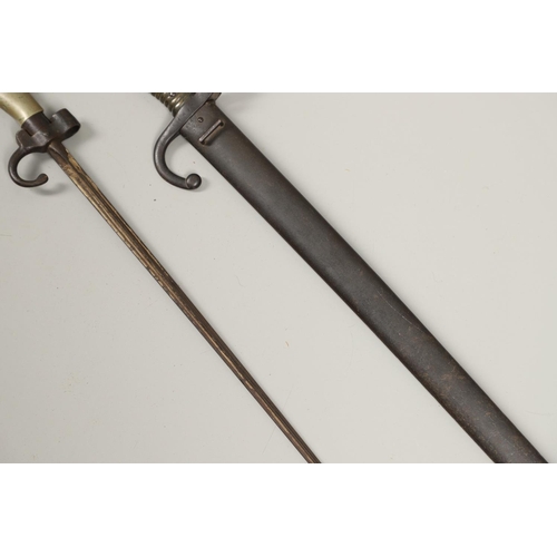 131 - A FRENCH 1886 PATTERN LEBEL EPEE BAYONET AND SIMILAR SWORD BAYONET AND SCABBARD. An Epee baynoet wit... 