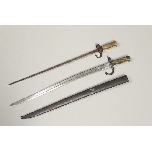 131 - A FRENCH 1886 PATTERN LEBEL EPEE BAYONET AND SIMILAR SWORD BAYONET AND SCABBARD. An Epee baynoet wit... 