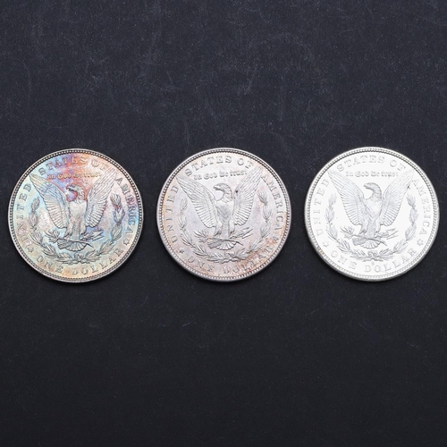 958 - THREE AMERICAN MORGAN DOLLARS, 1880 AND LATER. Three United States of America Morgan Dollars, 1880 (... 