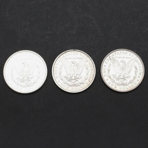 959 - THREE AMERICAN MORGAN DOLLARS, 1880 AND LATER. Three United States of America Morgan Dollars, 1880, ... 