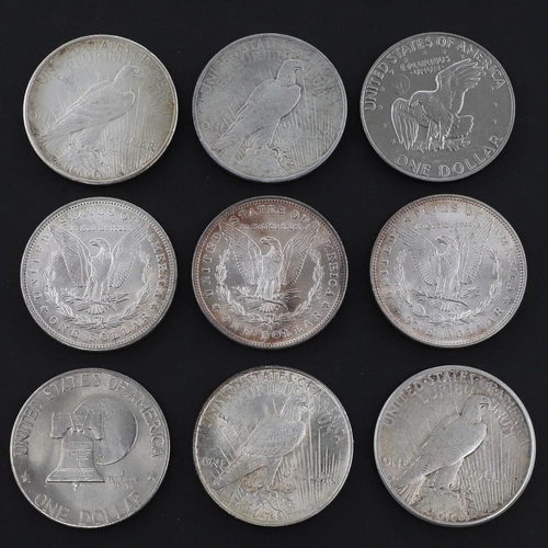 960 - A COLLECTION OF AMERICAN DOLLARS TO INCLUDE PEACE DOLLARS. 1881 AND LATER. U.S. Dollars for 1881, 18... 