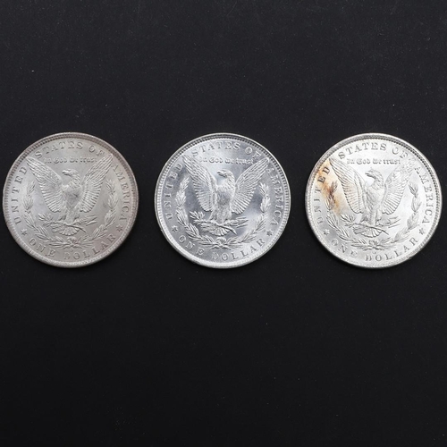 961 - THREE AMERICAN MORGAN DOLLARS, 1884 AND LATER. Three United States of America Morgan Dollars, 1884 (... 