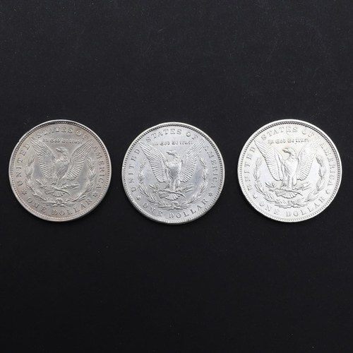 965 - THREE AMERICAN MORGAN DOLLARS, 1896 AND LATER. Three United States of America Morgan Dollars, 1896, ... 